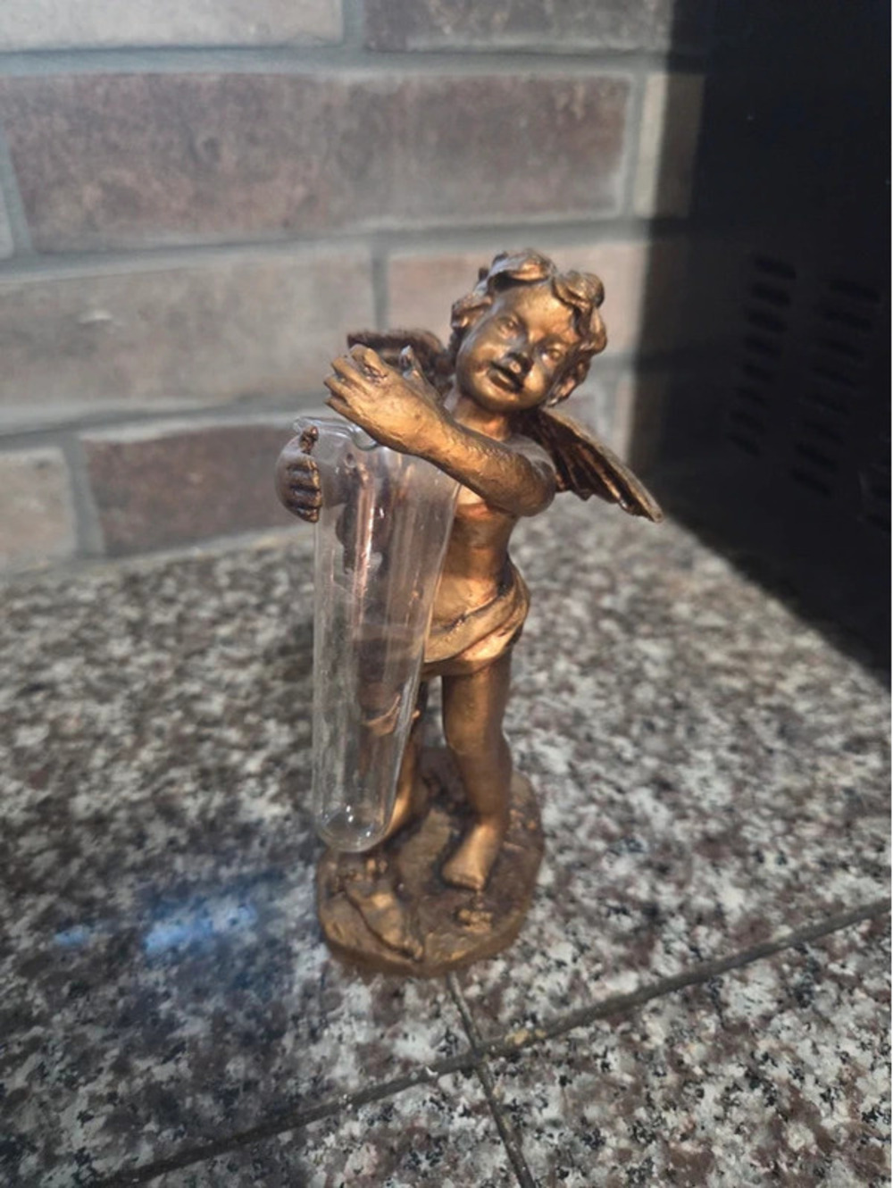 Vintage gold-toned cherub/angel bud vase